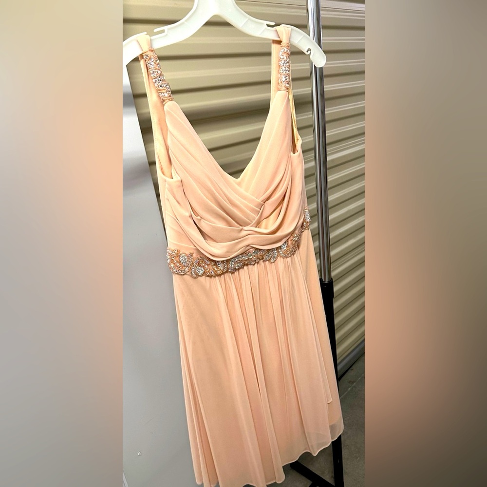 Cachet dress medium length size 10. Kept in bag.